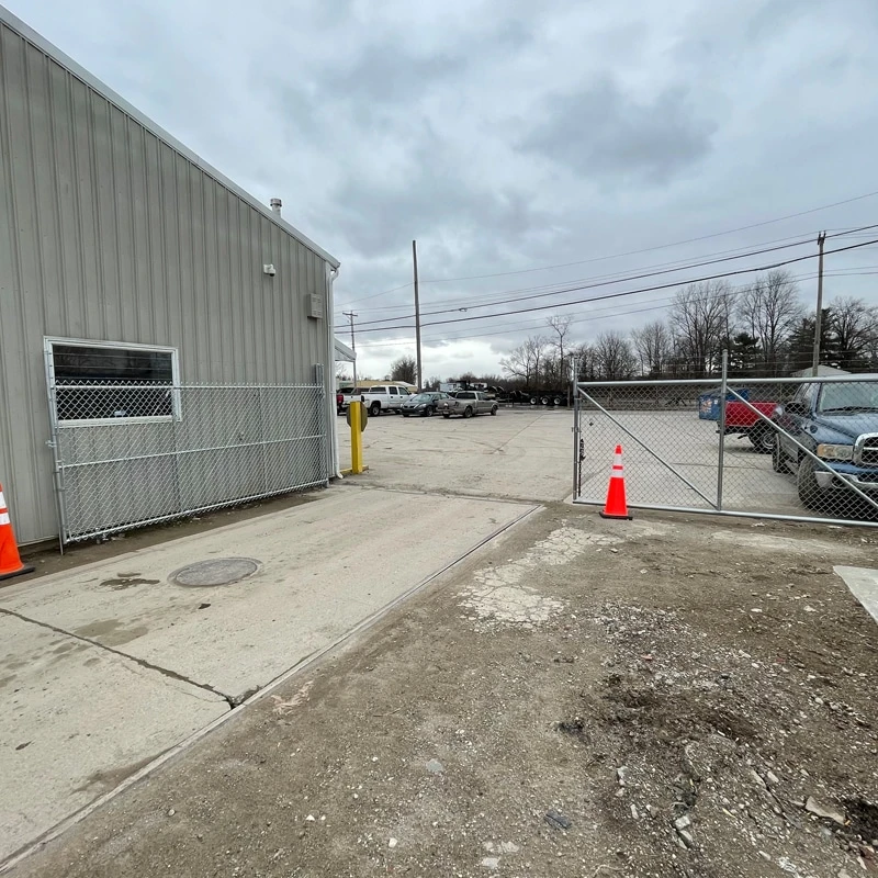 Roanoke fence company Commercial chain link security fence with double swing gate installation