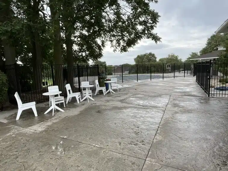 Black aluminum pool fence with secure gate installation in Fort Wayne, Indiana