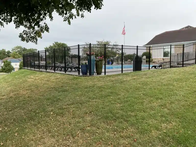 Black aluminum pool fence installation in Fort Wayne, Indiana by Allen County Fence